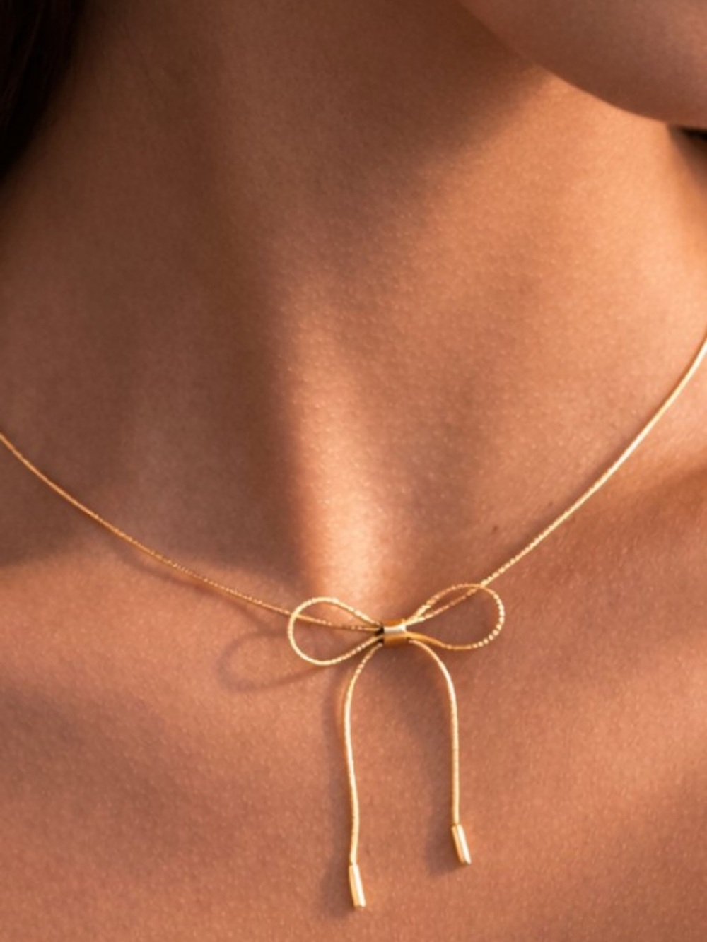 378. 18K gold Bow chain necklace